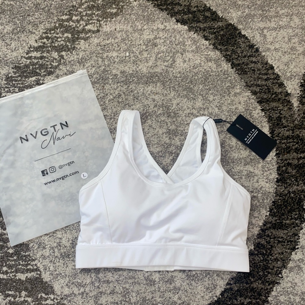 Brand new NVGTN white sports bra